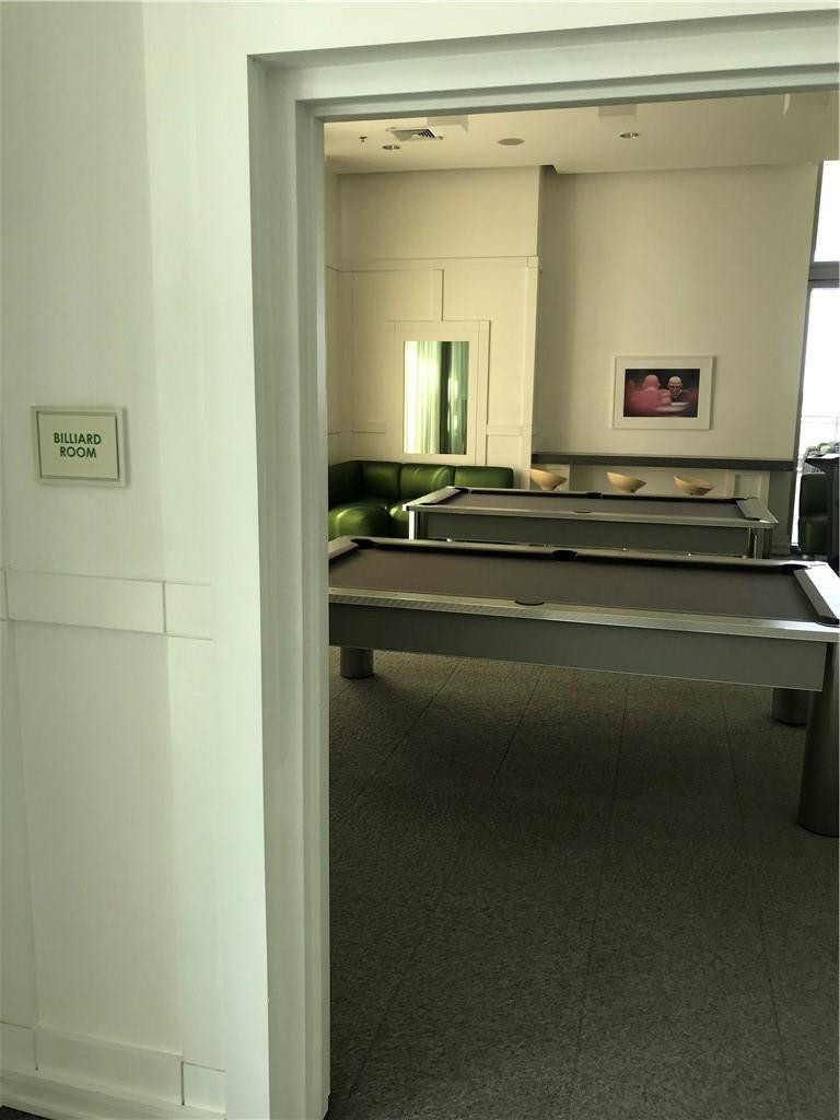 90 Southwest 3rd Street, Unit 1802 Miami, FL 33130 - Photo 34 of 50 a bathroom with a sink and a mirror