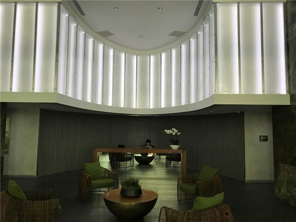 90 Southwest 3rd Street, Unit 1802 Miami, FL 33130 - Photo 40 of 50 a kitchen with furniture and a fireplace