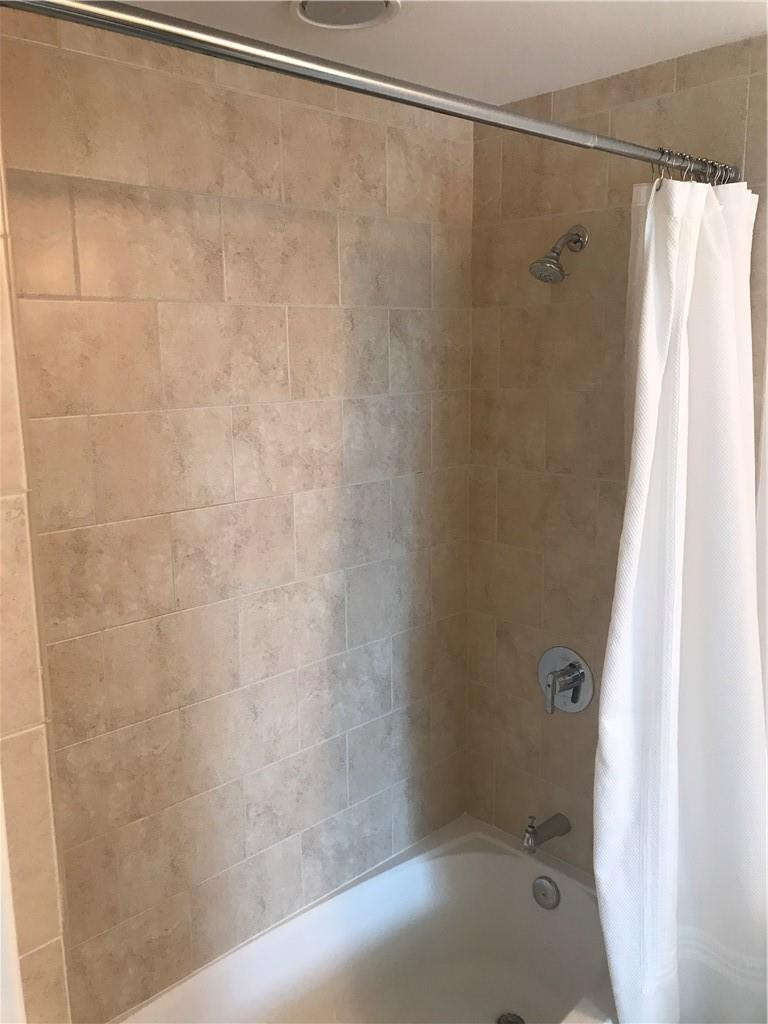 90 Southwest 3rd Street, Unit 1802 Miami, FL 33130 - Photo 9 of 50 a bathroom with a shower