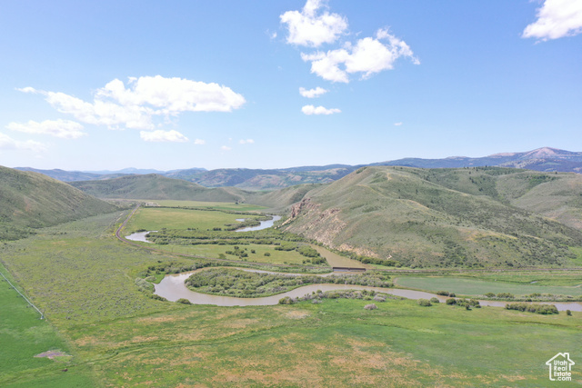 Undisclosed Address Georgetown, ID 83239 - Photo 10 of 11 View of mountain background featuring a nearby body of water and rural landscape