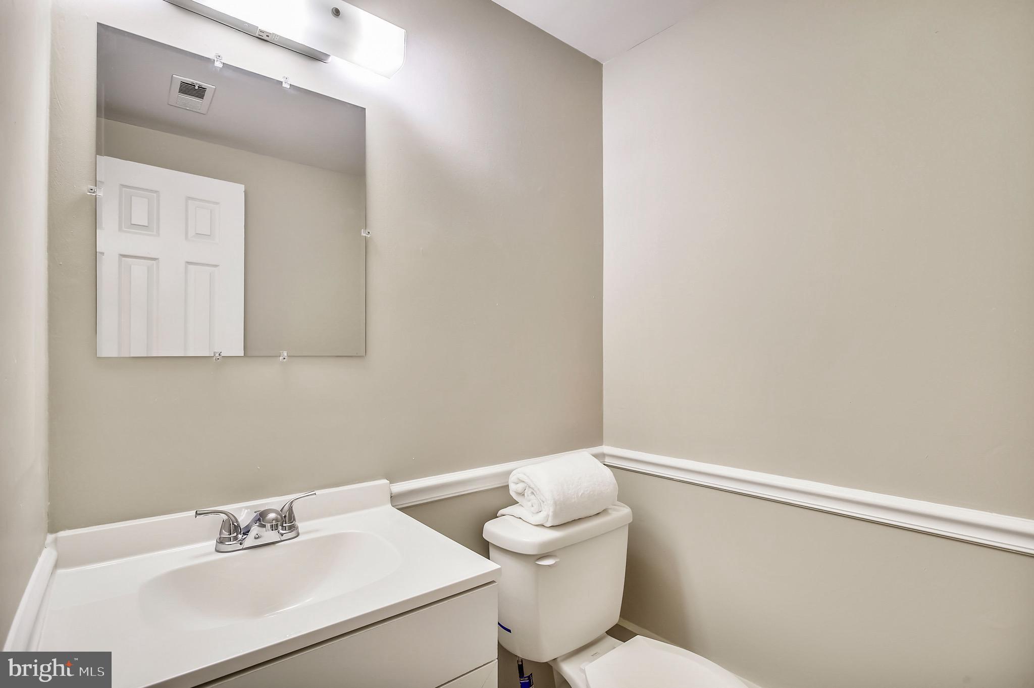 1053 Grovehill Road Halethorpe, MD 21227 - Photo 31 of 36 Downstairs Powder Room