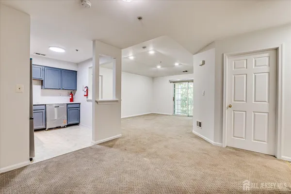 a kitchen with a stove and a sink