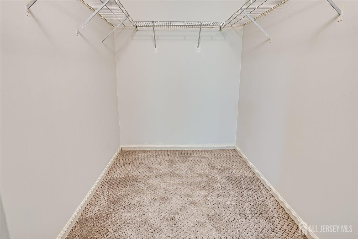 936 Waterford Drive Edison, NJ 08817 - Photo 22 of 29 a view of a room with racks on the wall