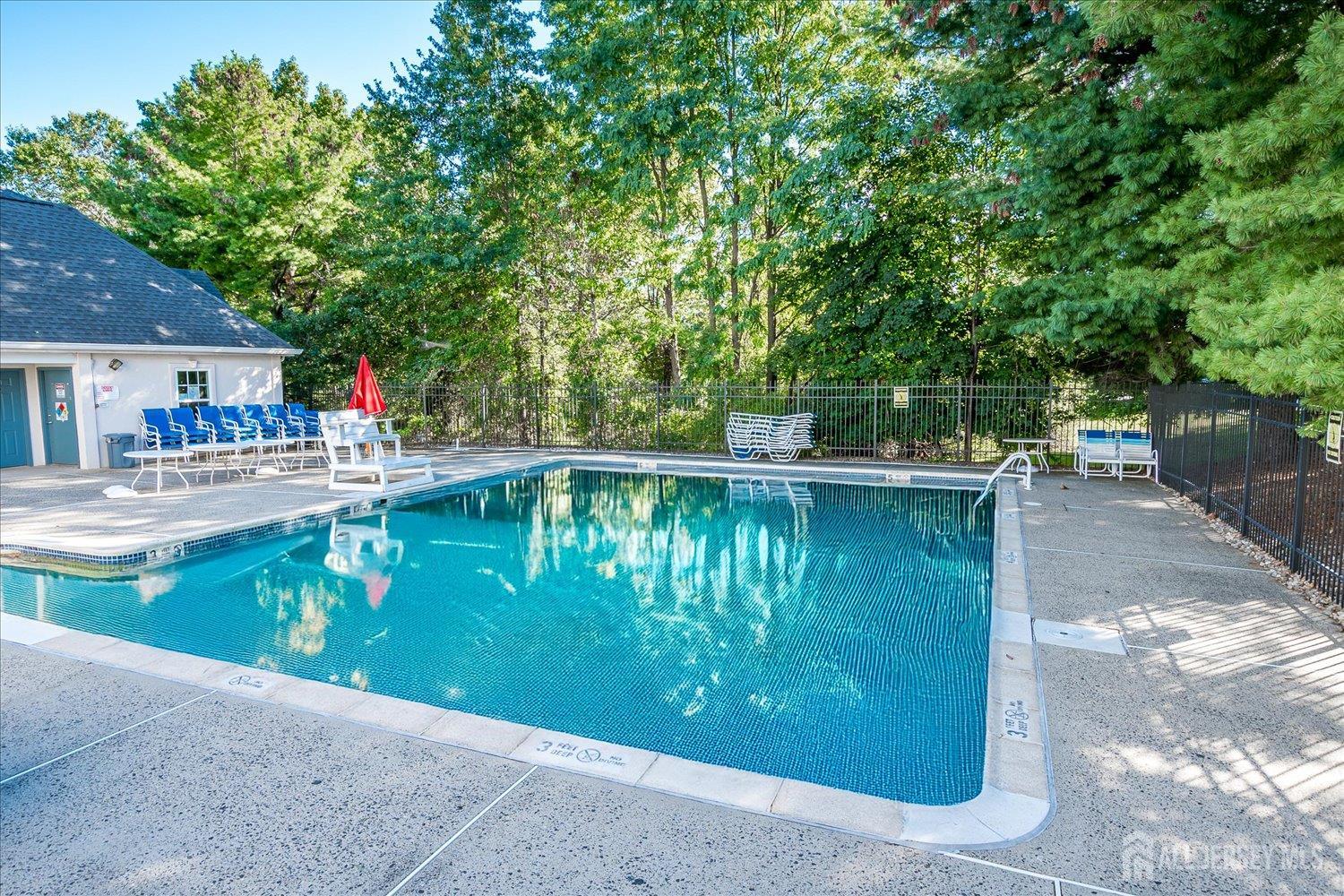 936 Waterford Drive Edison, NJ 08817 - Photo 26 of 29 a backyard of a house with outdoor seating