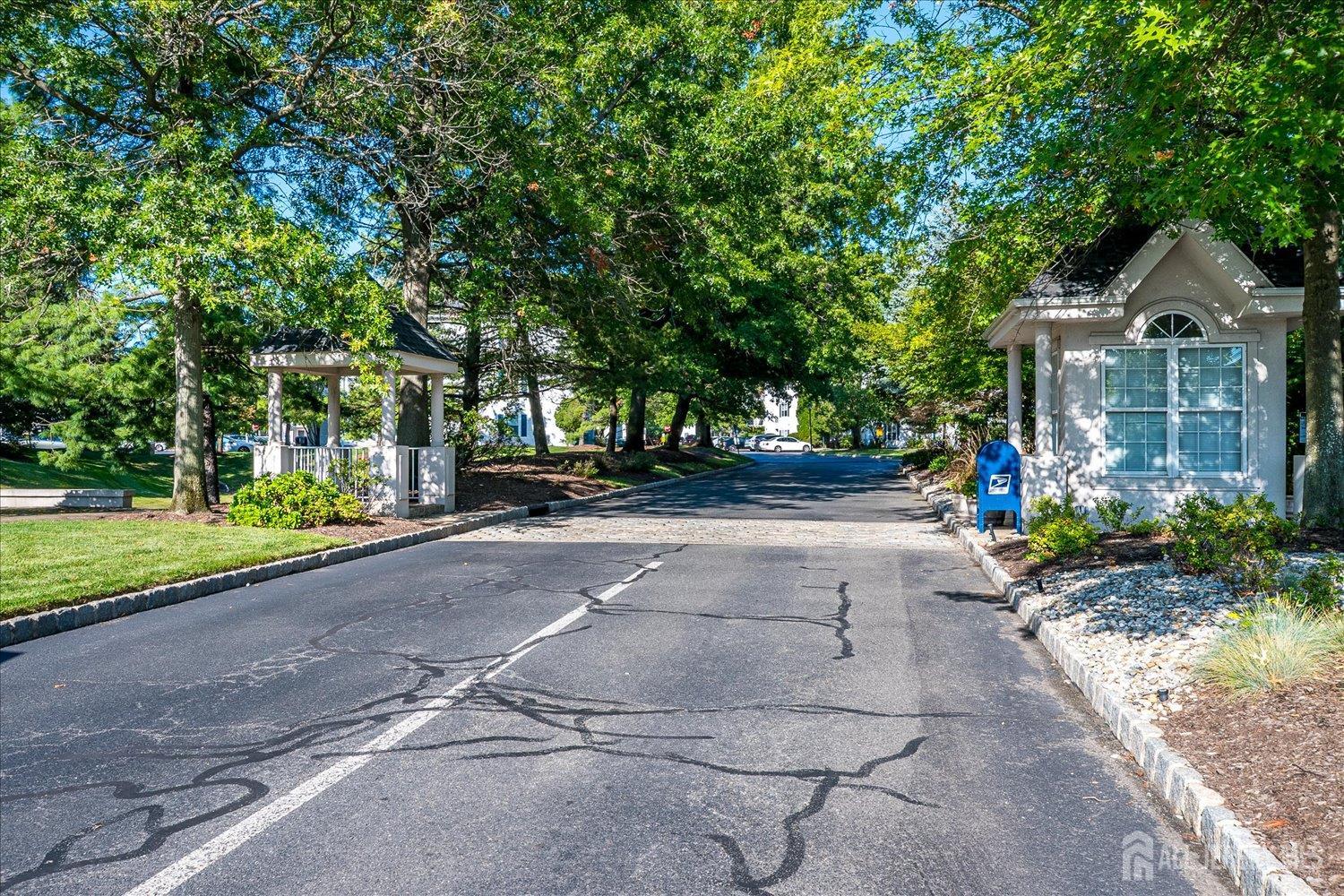 936 Waterford Drive Edison, NJ 08817 - Photo 27 of 29 a view of a house with a yard plants and large tree