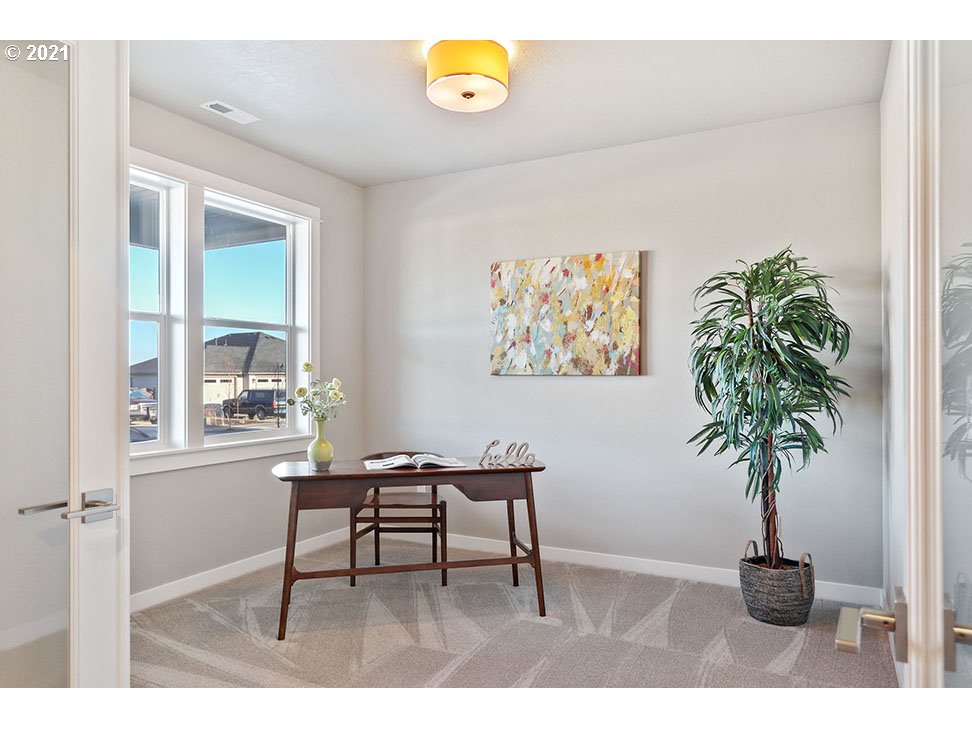 748 South 53rd Street Springfield, OR 97478 - Photo 5 of 13 a living room with furniture and a potted plant
