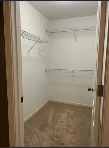 a view of a room with racks on the wall