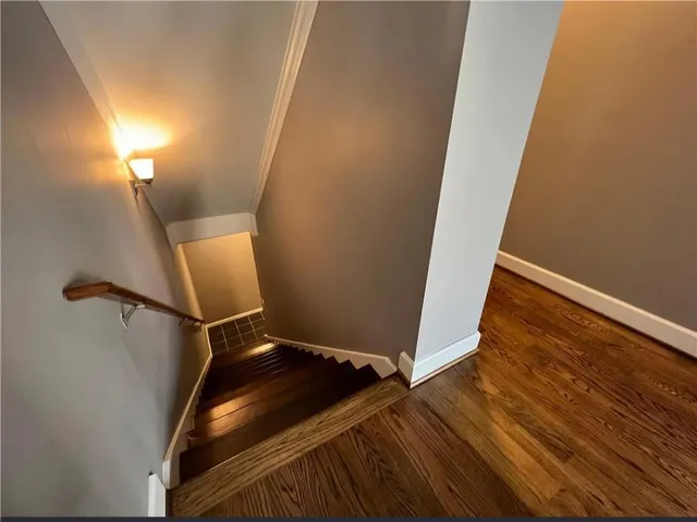 a view of entryway with wooden floor