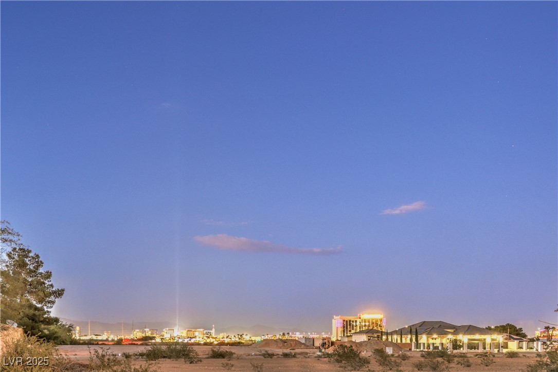 3910 West Pebble Road Las Vegas, NV 89139 - Photo 50 of 59 View of nature at dusk
Strip views