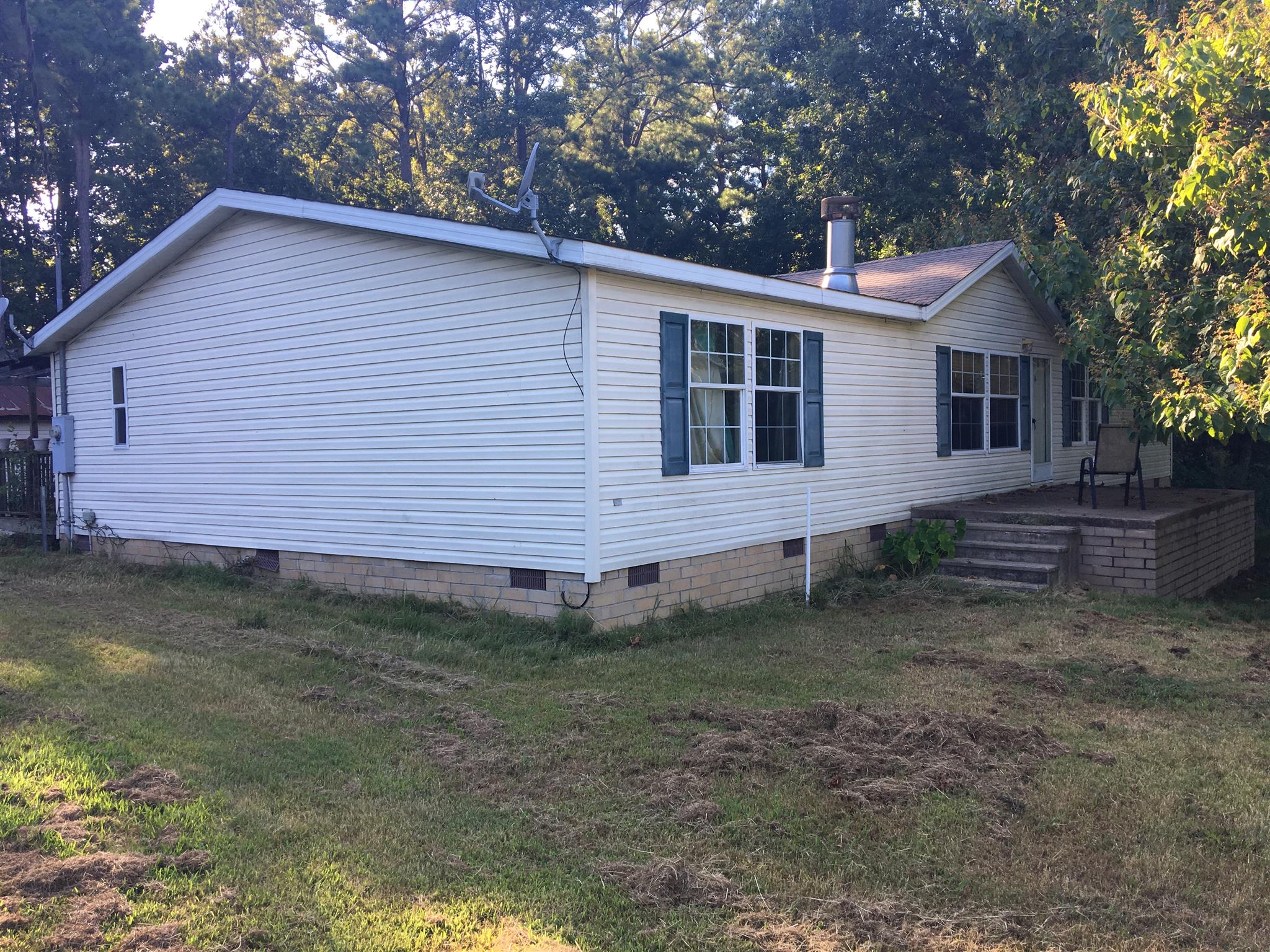 1628 McDonald Road Centerville, TN 37033 - Photo 3 of 7 a view of a house with a yard