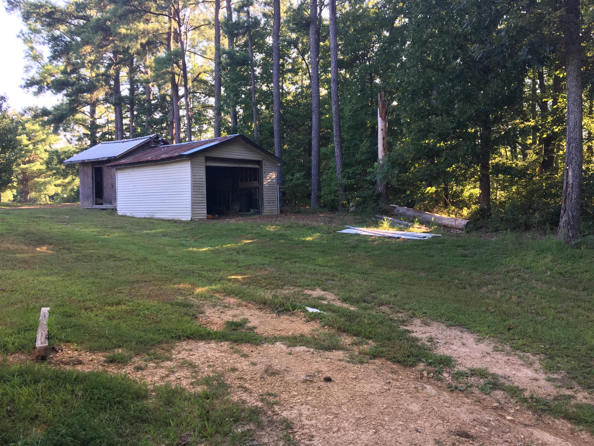 1628 McDonald Road Centerville, TN 37033 - Photo 6 of 7 a backyard of a house with lots of green space