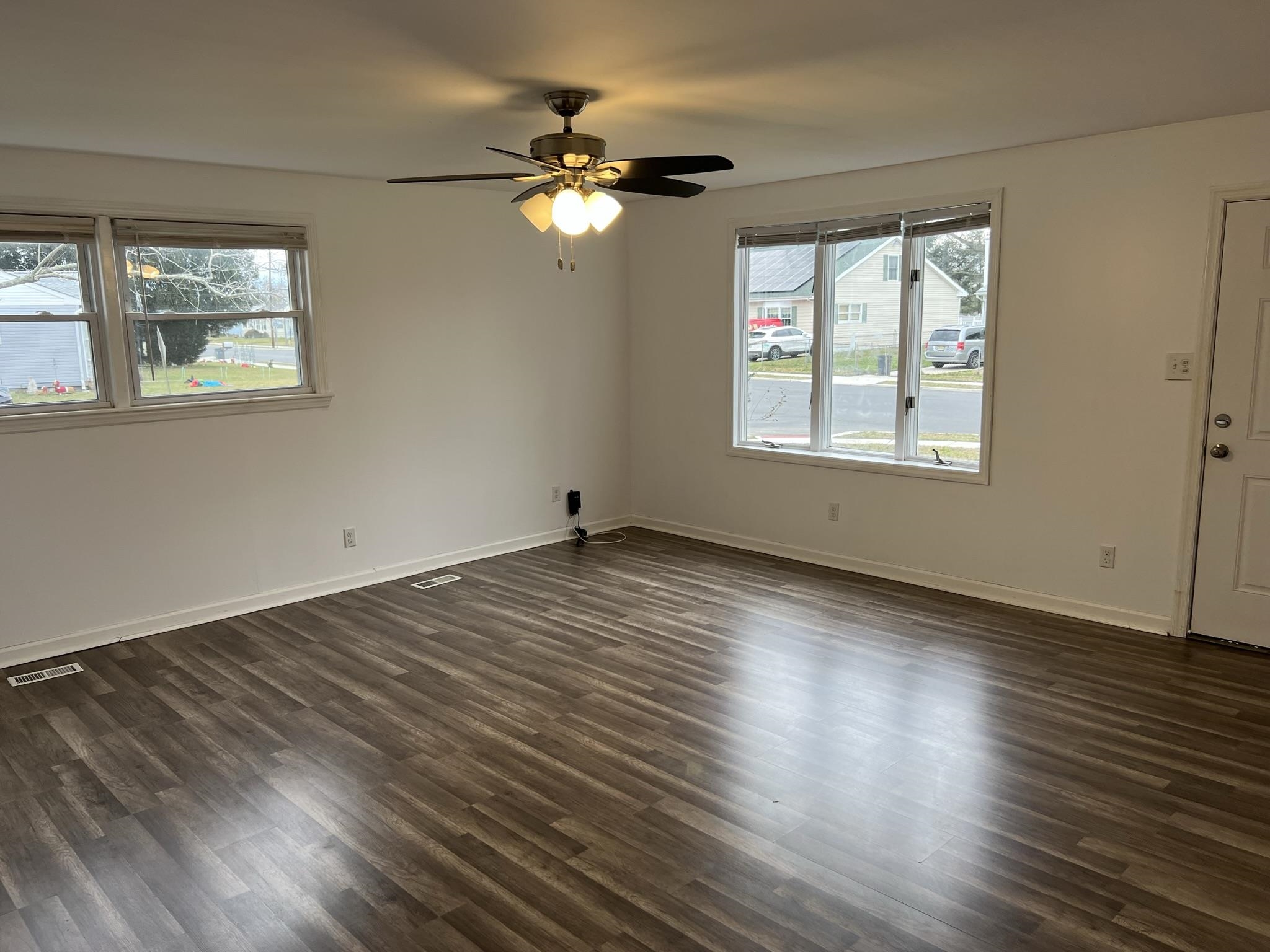 201 Linden Lane Rio Grande, NJ 08242 - Photo 16 of 18 a view of an empty room with wooden floor and a window
