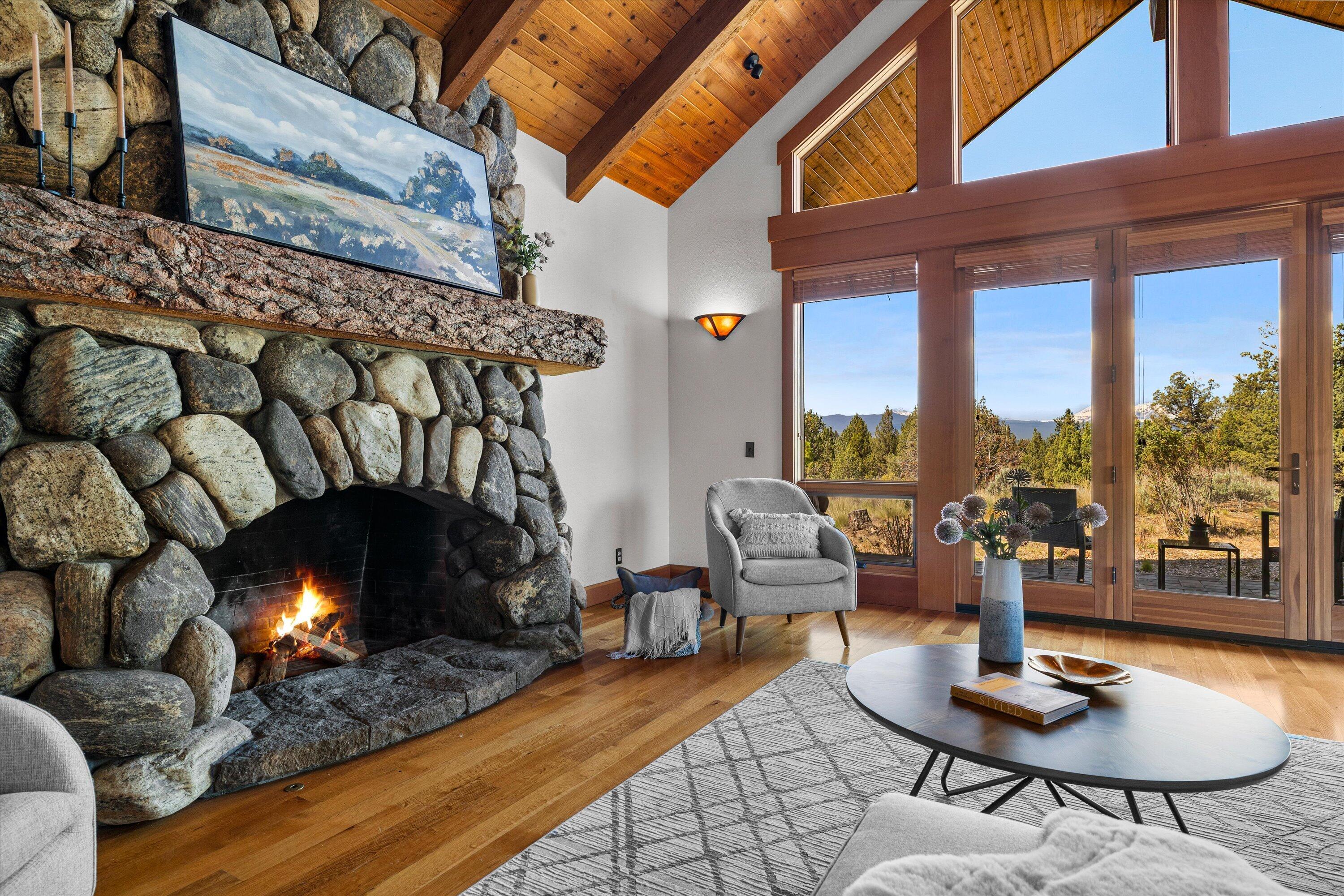 64155 Hunnell Road Bend, OR 97703 - Photo 13 of 96 Vaulted wood ceilings and exposed beams frame the views.