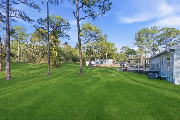 a view of yard with outdoor seating