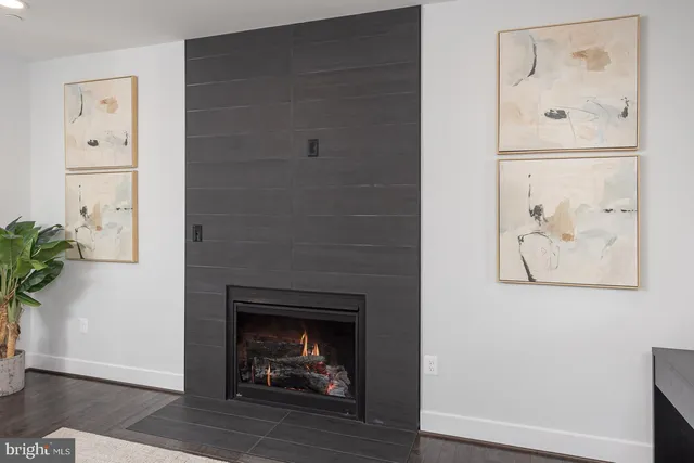 a bedroom with a bed and chair