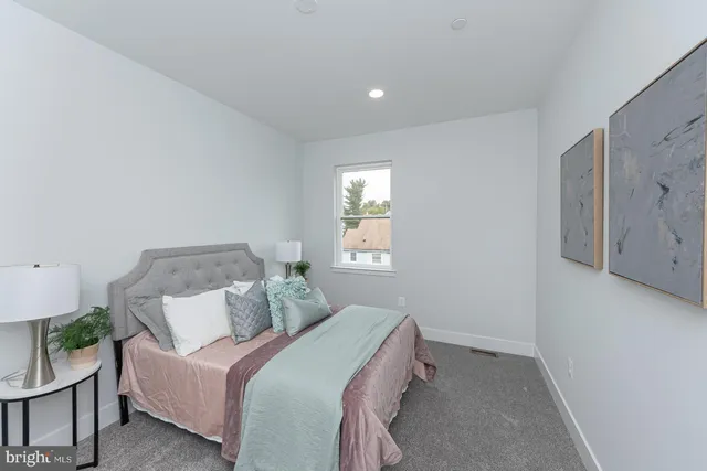 a bathroom with a sink a toilet and a bathtub