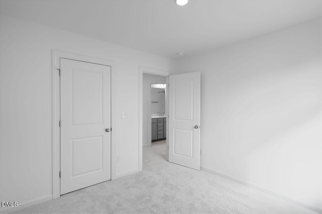 430 Rowe Way Knightdale, NC 27545 - Photo 23 of 51 a view of an empty room and closet