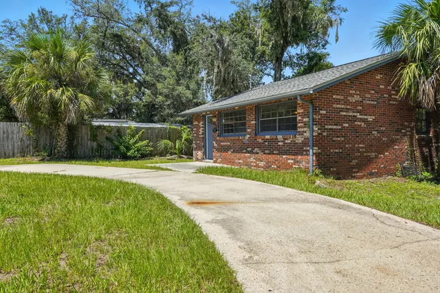 a view of a backyard with a garden
