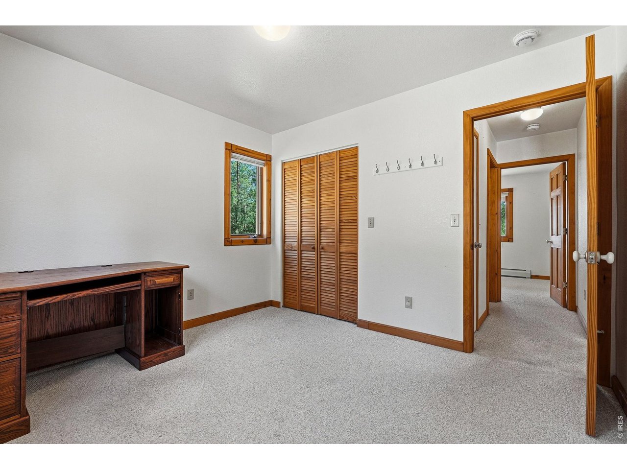 560 Quillan Gulch Road Loveland, CO 80537 - Photo 22 of 49 2nd bedroom on Main Upper Level