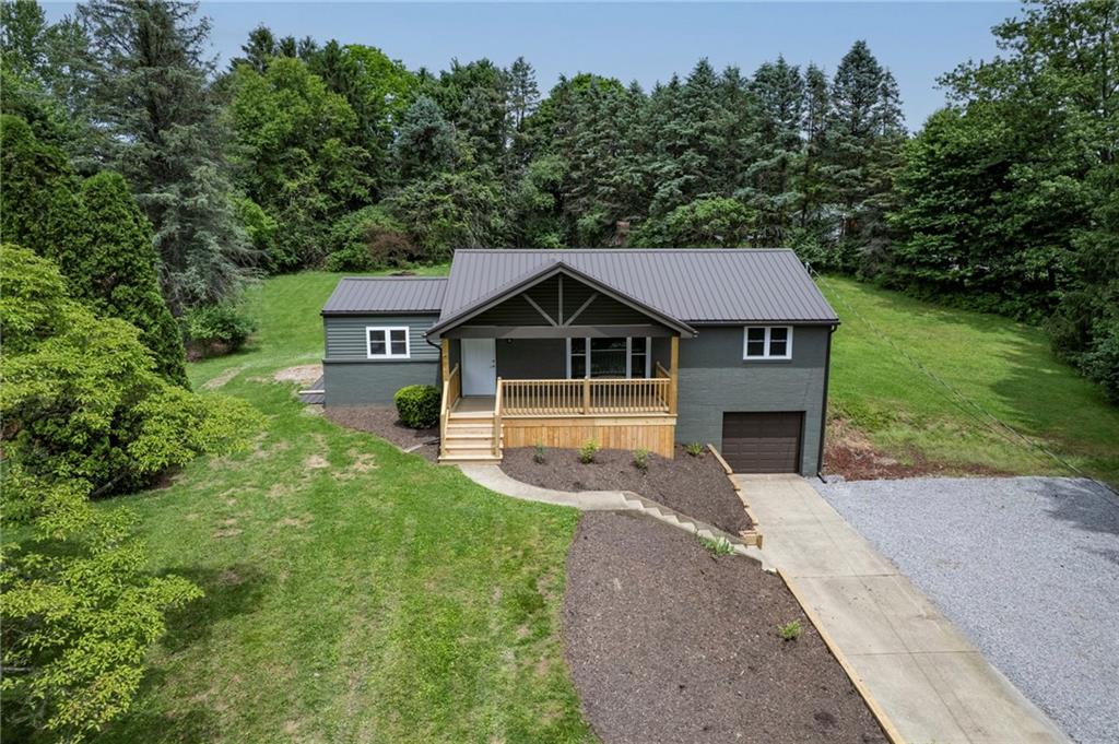 122 Springhouse Drive Butler, PA 16001 - Photo 35 of 42 Large driveway for extra parking and inviting curb appeal