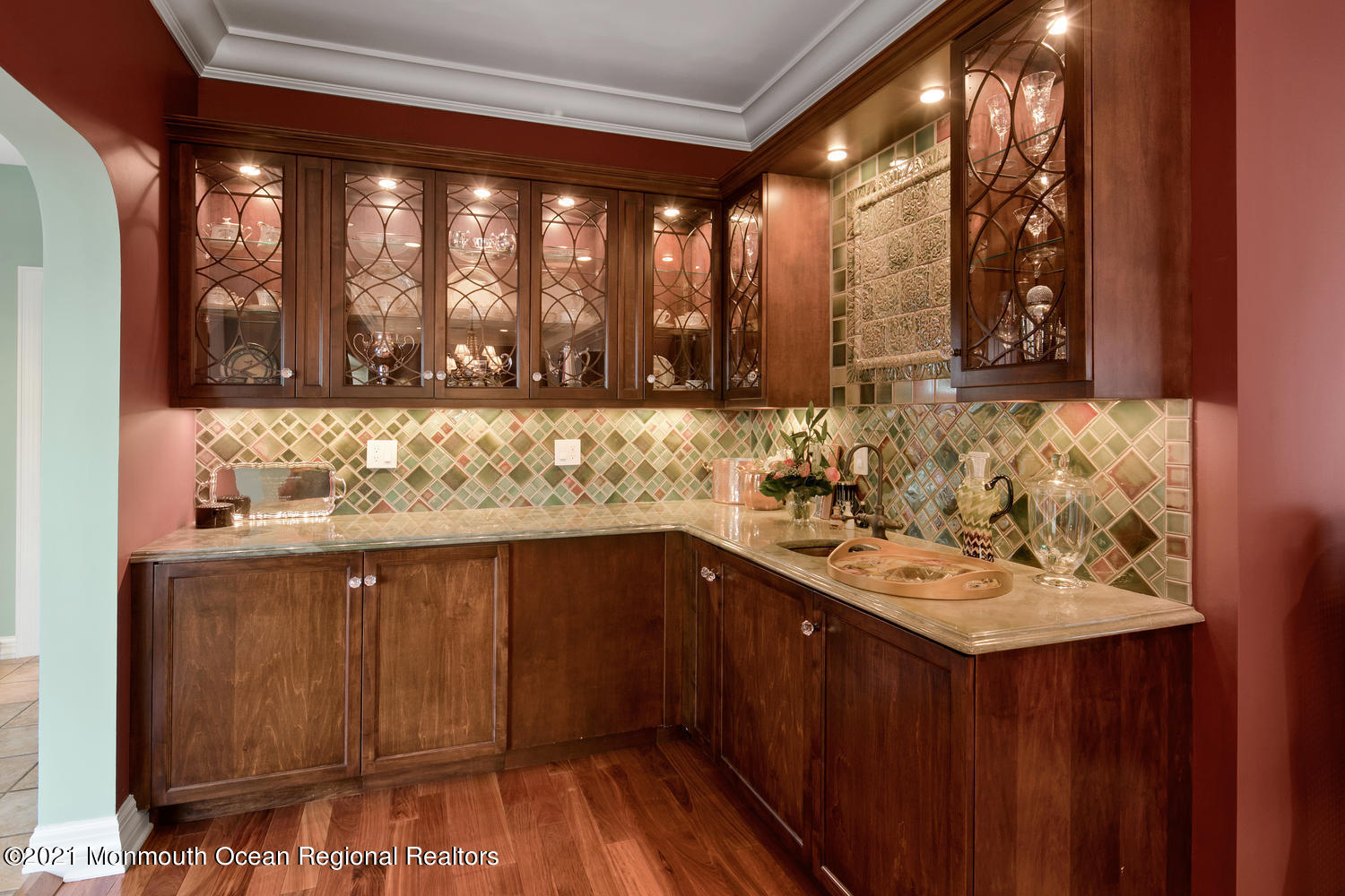 214 Conover Lane Red Bank, NJ 07701 - Photo 18 of 43 a kitchen with a sink and wooden cabinets