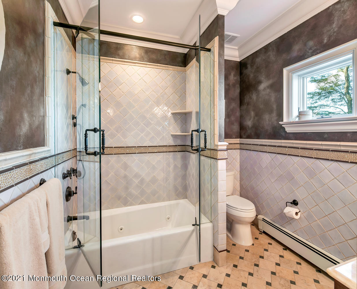 214 Conover Lane Red Bank, NJ 07701 - Photo 26 of 43 a bathroom with a shower a bathtub and a shower