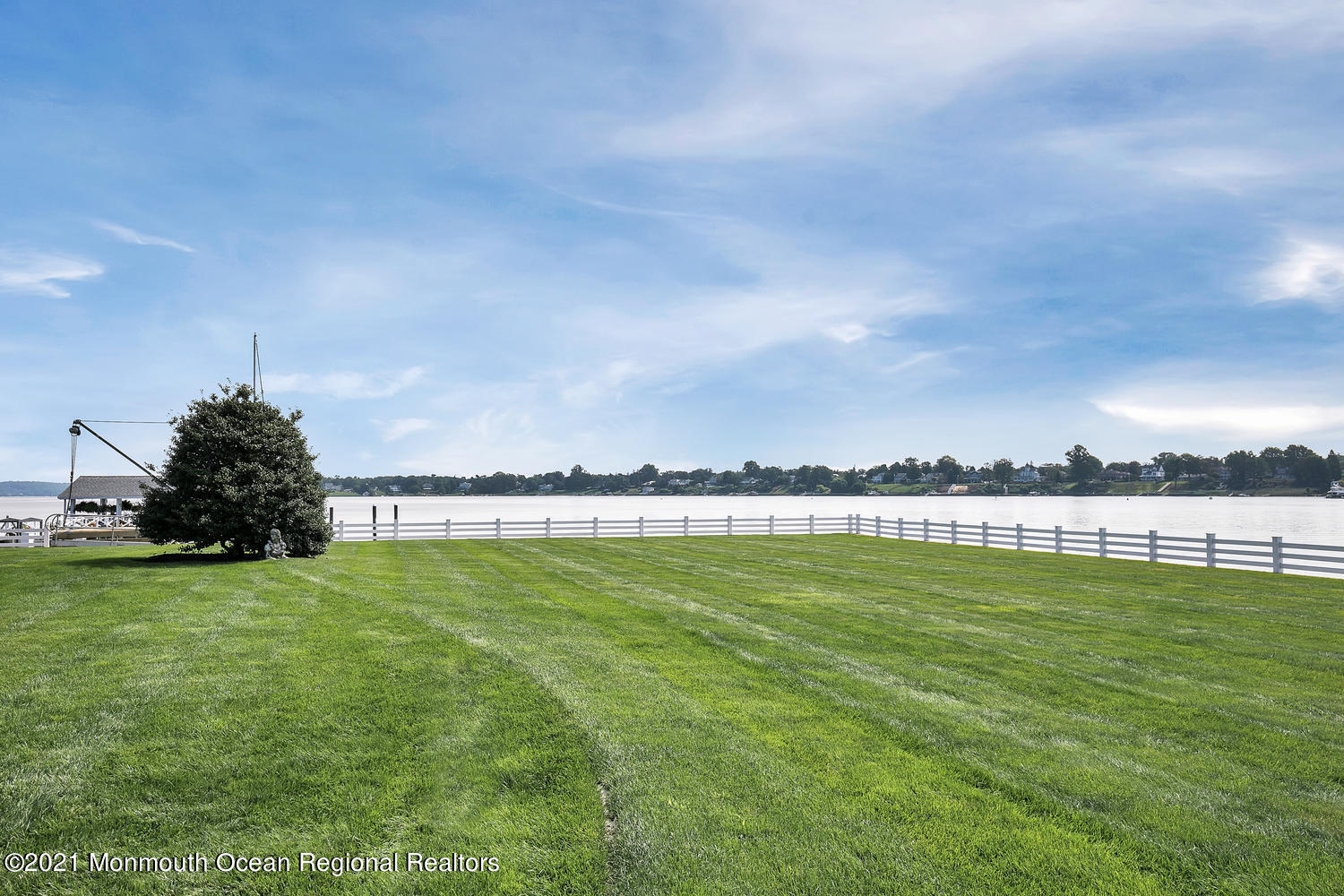 214 Conover Lane Red Bank, NJ 07701 - Photo 39 of 43 a view of a lake and a yard