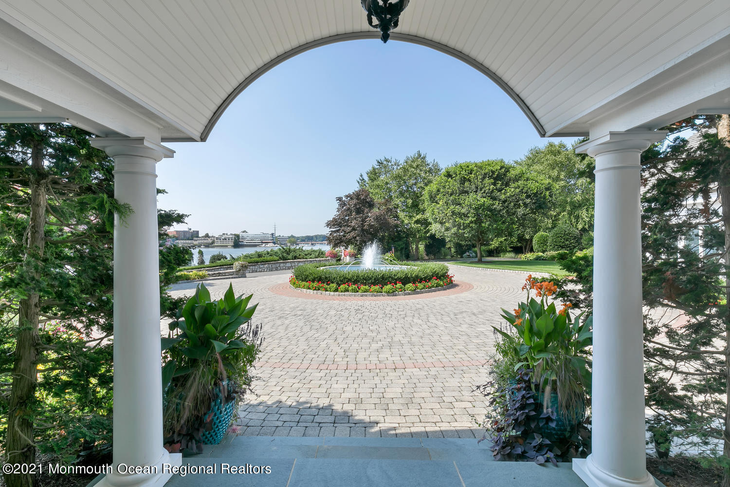 214 Conover Lane Red Bank, NJ 07701 - Photo 42 of 43 a view of a fountain in front of a house