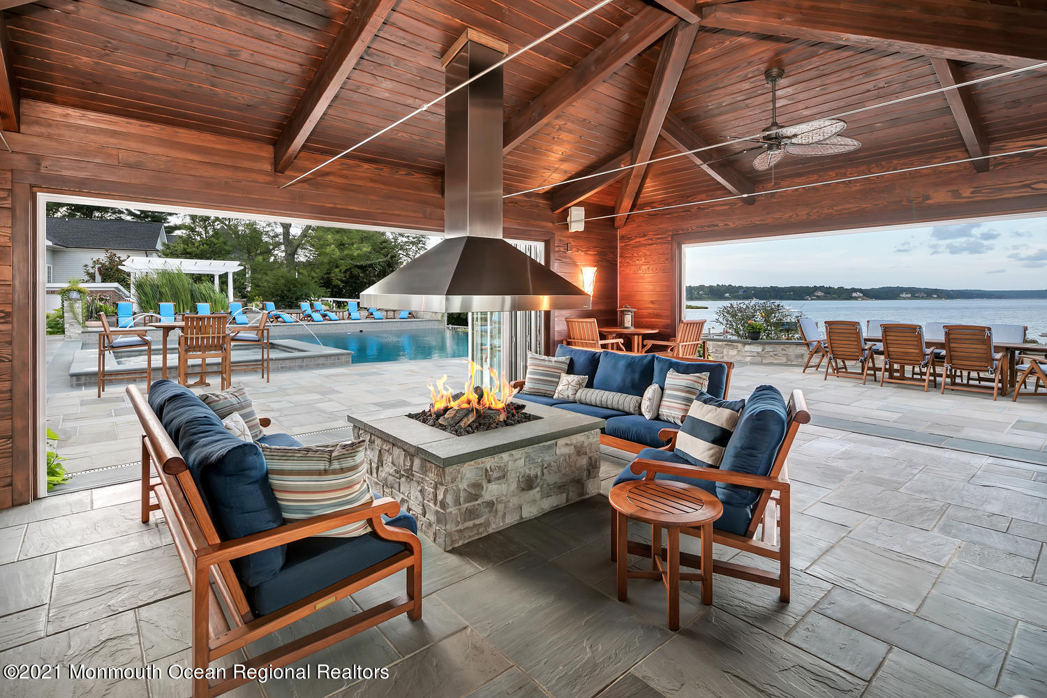 214 Conover Lane Red Bank, NJ 07701 - Photo 6 of 43 a patio with a table and chairs
