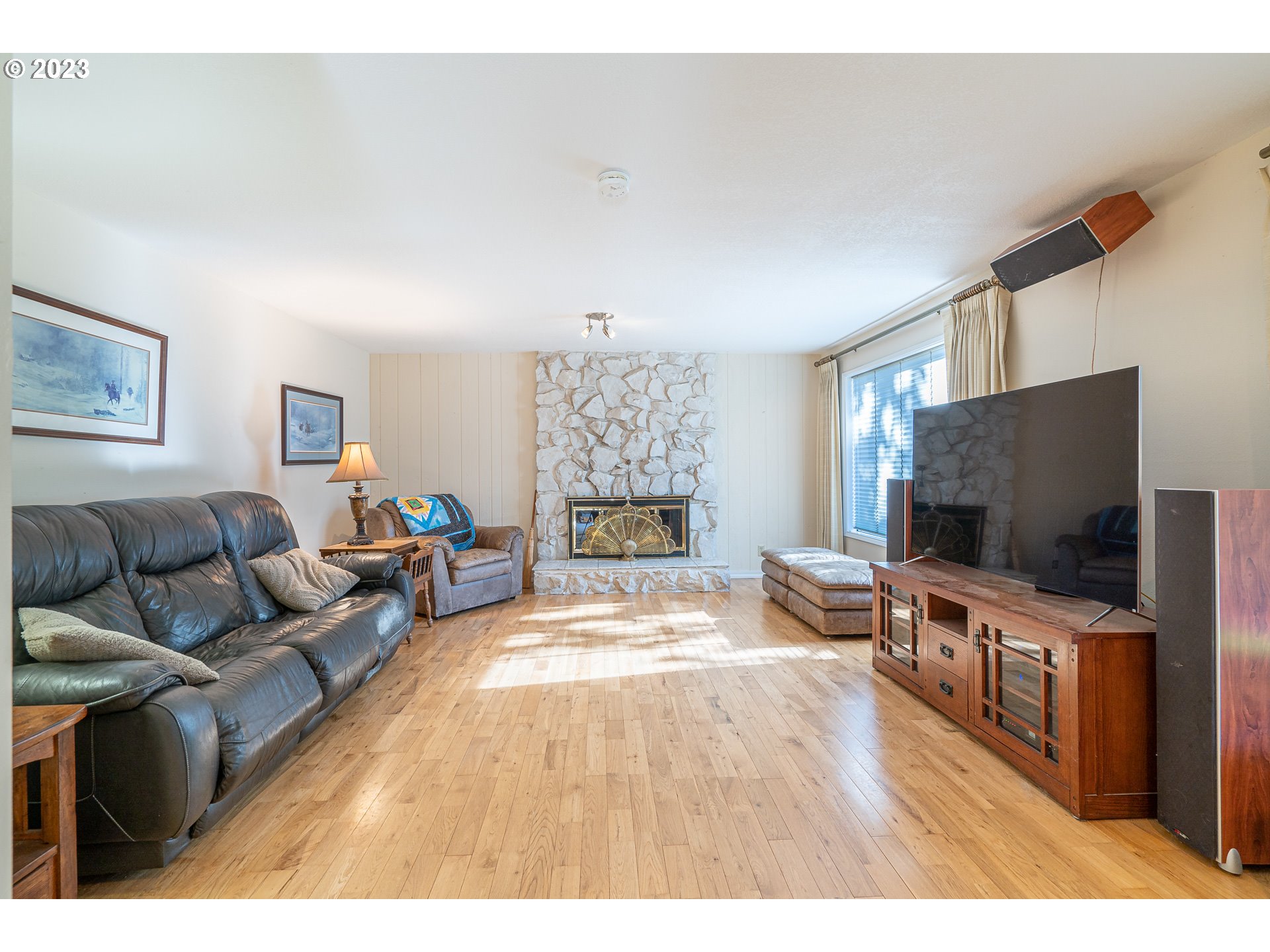 28171 Clear Lake Road Eugene, OR 97402 - Photo 25 of 48 a living room with furniture and a flat screen tv