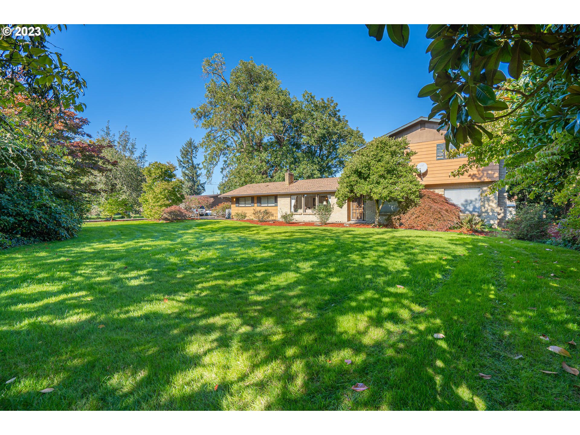 28171 Clear Lake Road Eugene, OR 97402 - Photo 27 of 48 a view of a house with a yard