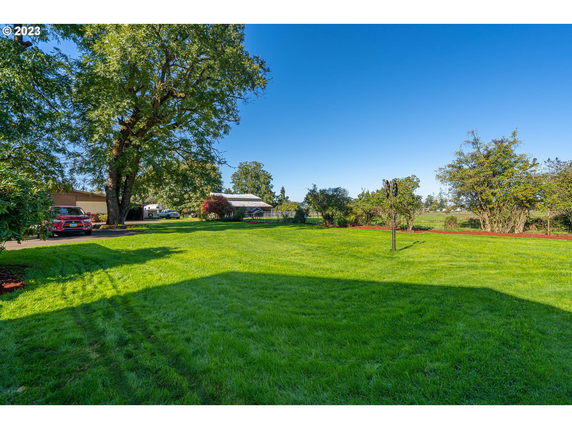 28171 Clear Lake Road Eugene, OR 97402 - Photo 36 of 48 a view of field with trees in the background