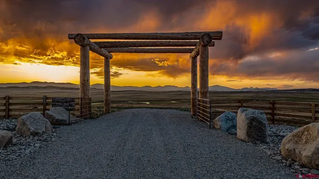 a view of a pathway both side of yard