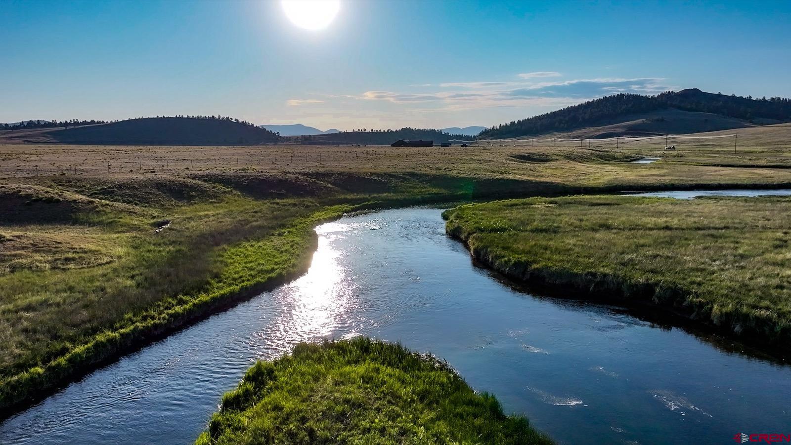 33145 Highway 9 Hartsel, CO 80449 - Photo 8 of 43 a view of a lake with a mountain