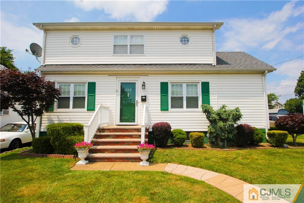 503 Crows Mill Road Fords, NJ 08863 - Photo 1 of 19 a front view of house with yard and green space