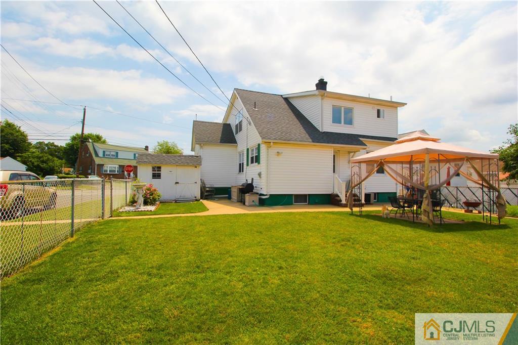 503 Crows Mill Road Fords, NJ 08863 - Photo 17 of 19 a swimming pool with outdoor seating and yard
