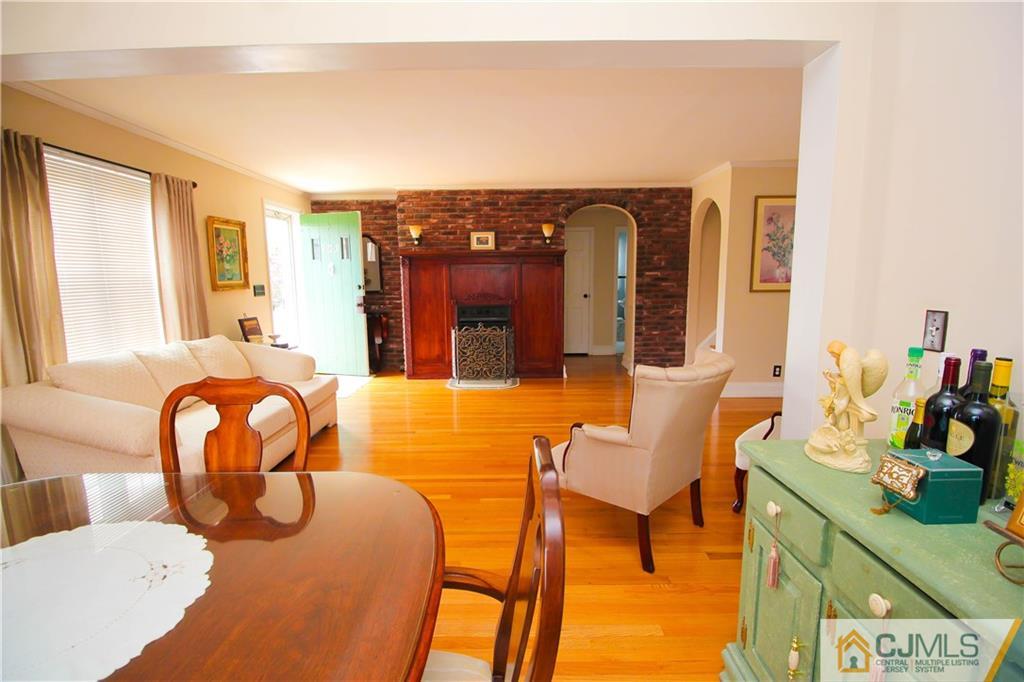 503 Crows Mill Road Fords, NJ 08863 - Photo 3 of 19 a living room with furniture and a table