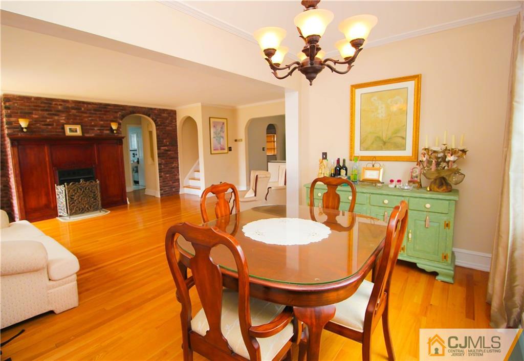 503 Crows Mill Road Fords, NJ 08863 - Photo 4 of 19 a dining room with furniture and chandelier