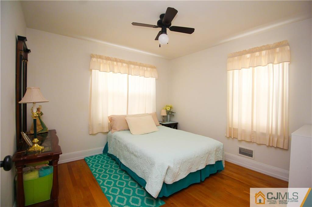 503 Crows Mill Road Fords, NJ 08863 - Photo 7 of 19 a bedroom with a bed and a window