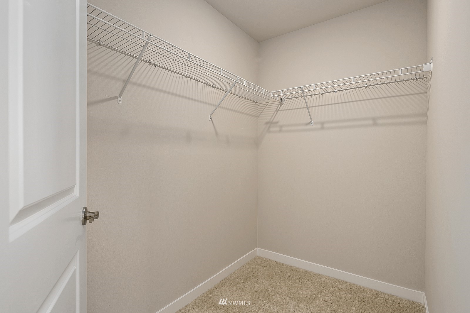 3521 193rd Street Southeast, Unit F Bothell, WA 98012 - Photo 20 of 29 a view of a room with racks on the wall