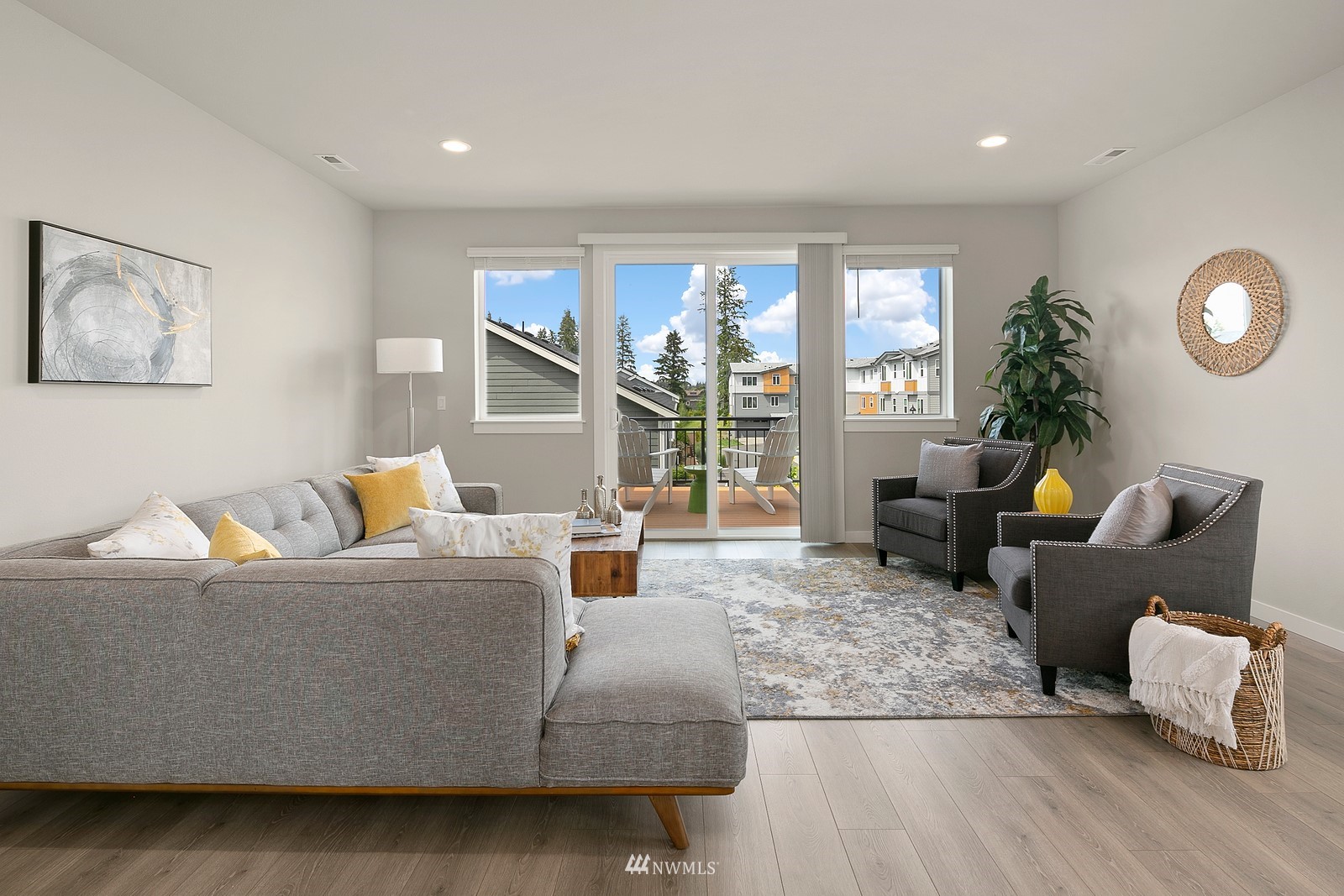 3521 193rd Street Southeast, Unit F Bothell, WA 98012 - Photo 5 of 29 a living room with furniture and wooden floor
