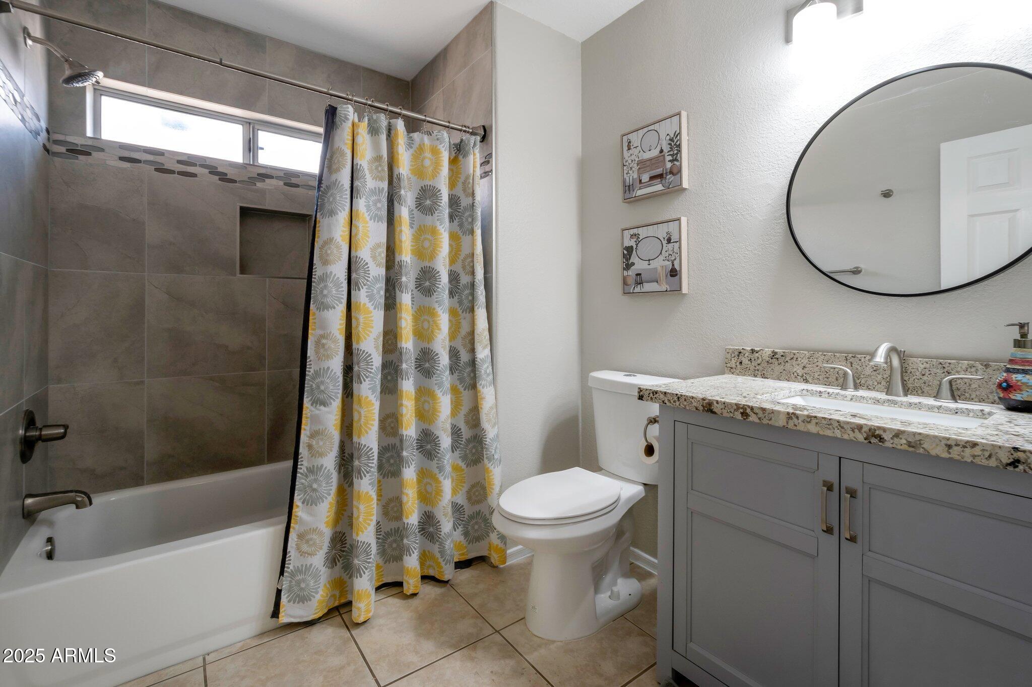 839 West Silver Creek Road Gilbert, AZ 85233 - Photo 11 of 15 a bathroom with a sink toilet and shower