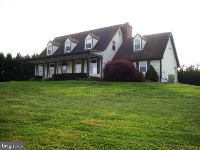 20535 Bucklodge Road Boyds, MD 20841 - Photo 2 of 30 a view of a building with a garden