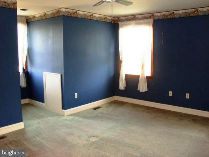 20535 Bucklodge Road Boyds, MD 20841 - Photo 17 of 30 a view of an empty room with a closet