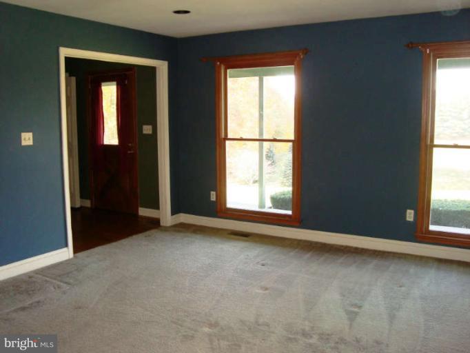 20535 Bucklodge Road Boyds, MD 20841 - Photo 3 of 30 an empty room with windows and closet