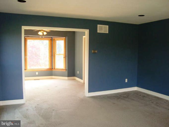 20535 Bucklodge Road Boyds, MD 20841 - Photo 4 of 30 a view of an empty room with a window