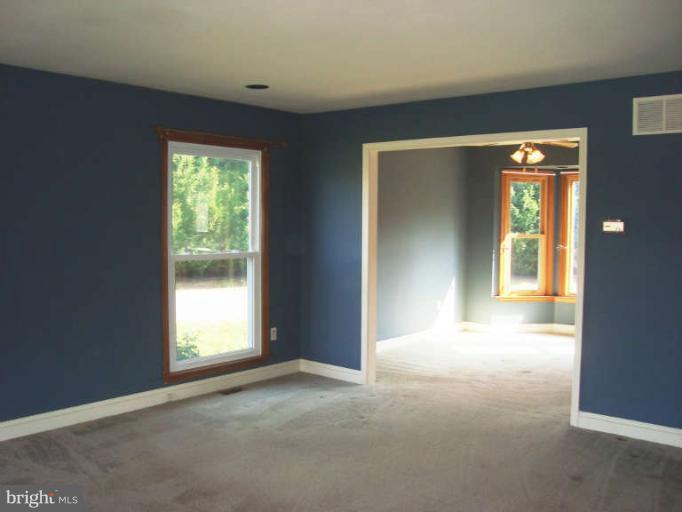 20535 Bucklodge Road Boyds, MD 20841 - Photo 5 of 30 a view of empty room with window