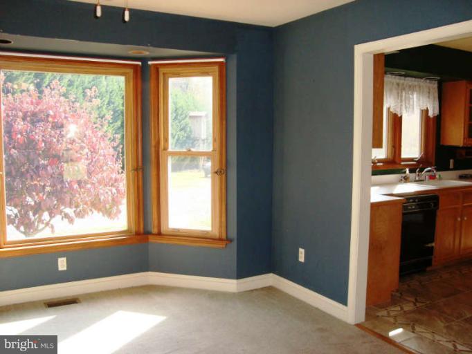20535 Bucklodge Road Boyds, MD 20841 - Photo 6 of 30 a view of an empty room with a window