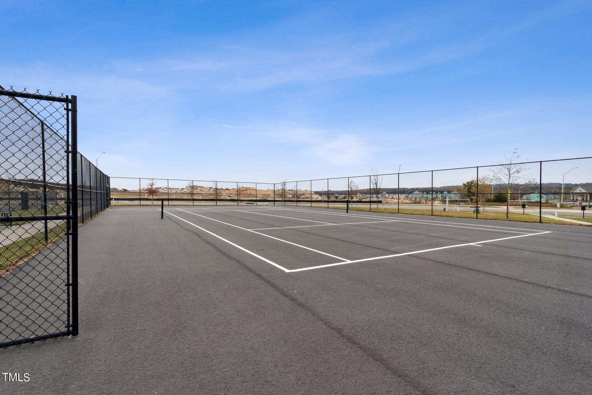 4921 Microcline Trail, Unit 790 Raleigh, NC 27610 - Photo 30 of 46 a view of a tennis court
