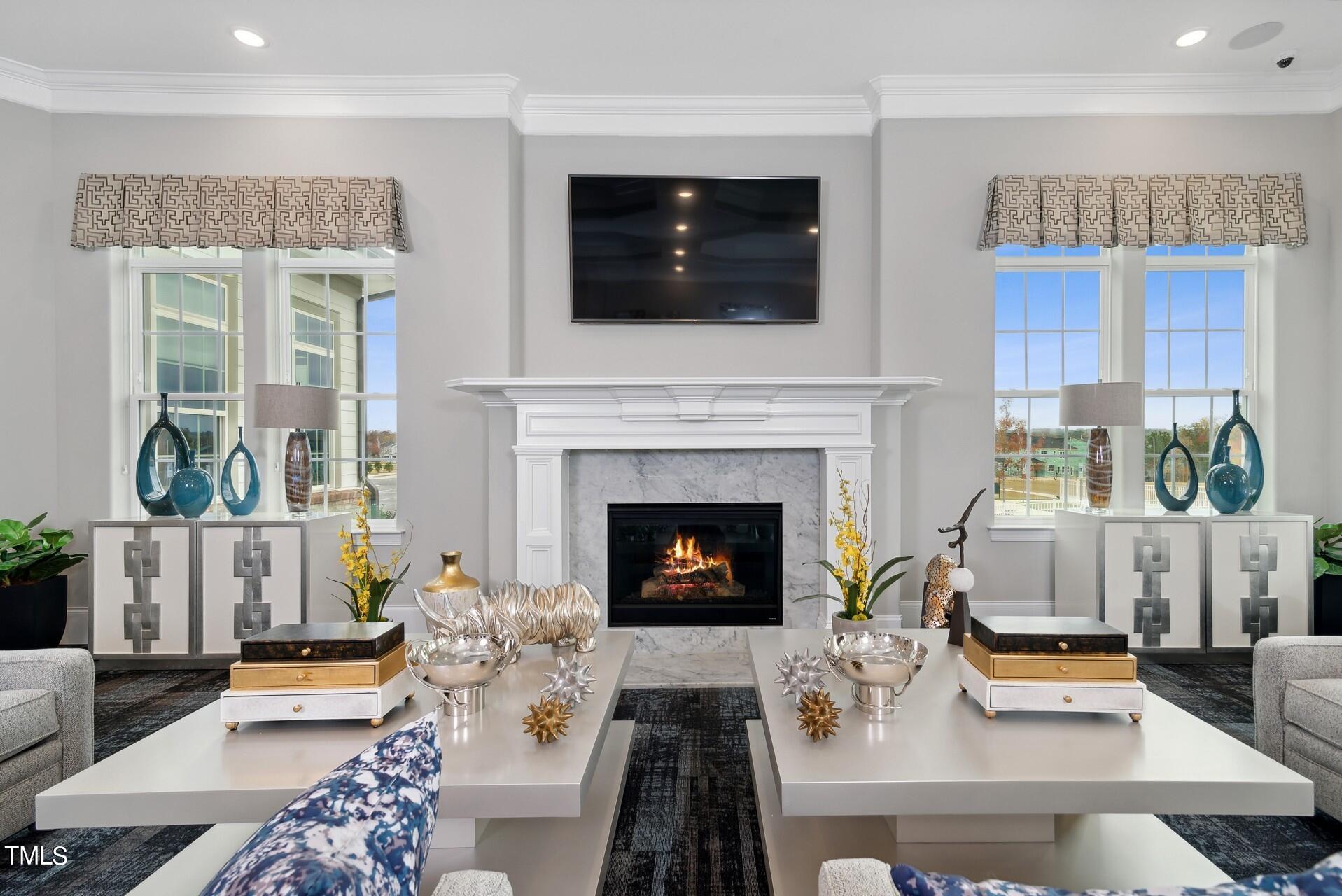 4921 Microcline Trail, Unit 790 Raleigh, NC 27610 - Photo 33 of 46 a living room with furniture and a fireplace